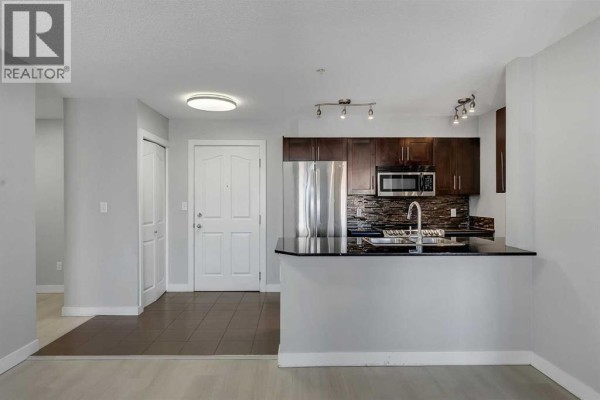 Dining room - 2402, 403 Mackenzie Way Sw, Airdrie, AB T4B3V7 Photo 5