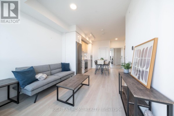 Living room - 2406 - 50 Upper Mall Way, Vaughan, ON L4J0L8 Photo 4