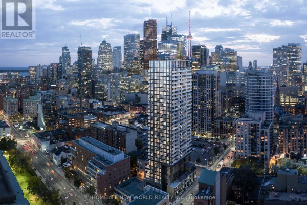 Aerial view of a tall condominium building surrounded by the Toronto city skyline at dusk. - 2408 - 47 Mutual Street, Toronto