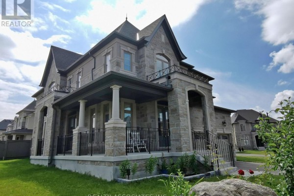 Home office with dark hardwood floors, white walls, a desk with a computer, and two windows. - 241 Stormont Trail, Vaughan