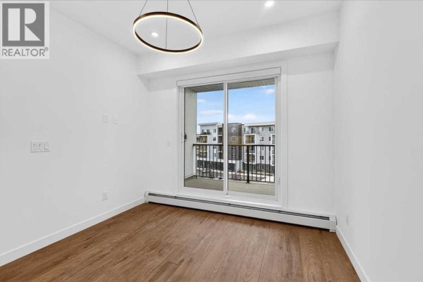 Primary Bedroom - 2412, 265 Wolf Willow Boulevard Se, Calgary, AB T2X6R1 Photo 3