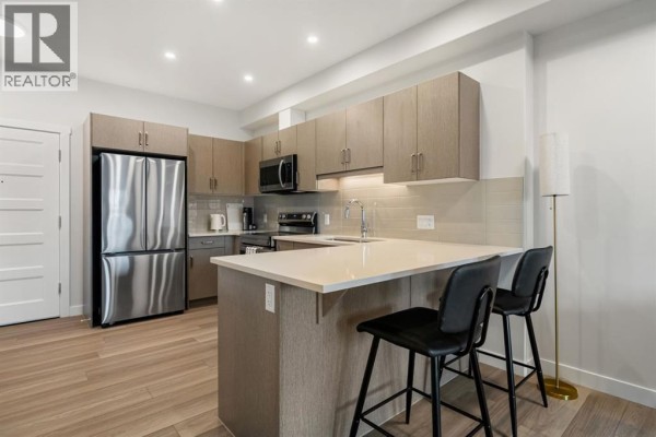 Living room - 2413, 2117 81 Street Sw, Calgary, AB T3H6H5 Photo 3