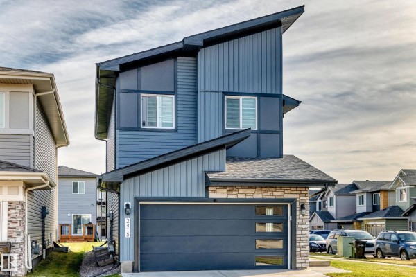 Family room - 2415 194 St Nw, Edmonton, AB T6M1P5 Photo 3