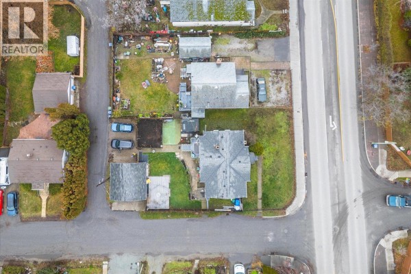 Top-down view of the two houses and outbuildings on the property at 2415 Pandosy Street. - 2415 Pandosy Street, Kelowna