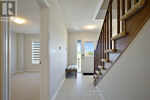 Family room - 2436 Harmony Road N, Oshawa, ON L1H8L7 Photo 4
