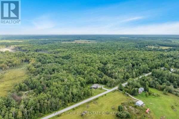 Aerial map overlay showing property boundaries outlined in red on a topographical map. - 2444 Fairgrounds Road, Ramara