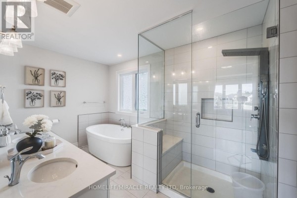 Freestanding bathtub and glass shower - 245 Tamarack Boulevard Woodstock