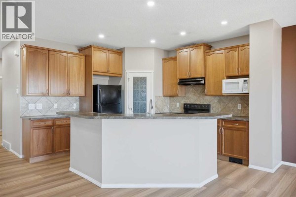 Living room - 249 Saddlecrest Way Ne, Calgary, AB T3J5N3 Photo 3
