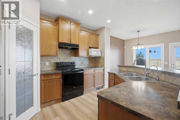 Den - 249 Saddlecrest Way Ne, Calgary, AB T3J5N3 Photo 4