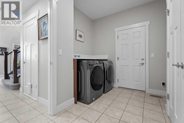 Laundry room - 25 Cimarron Springs Court, Okotoks, AB T1S0M1 Photo 4
