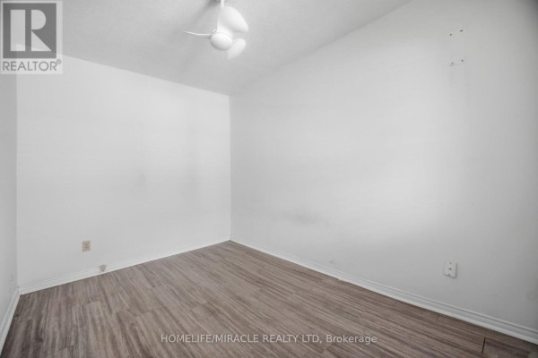 Room with ceiling fan and wood-look flooring - 25 Hope Avenue Hamilton