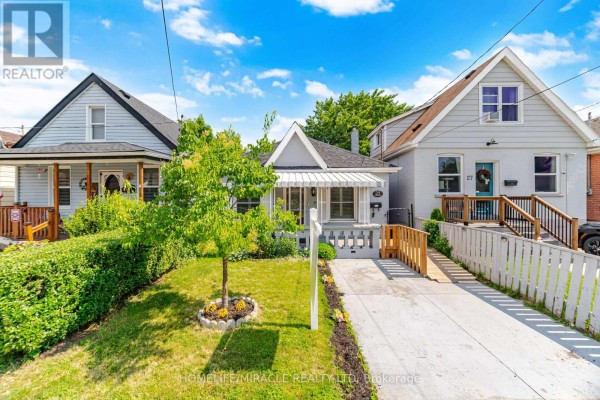 Front of house with awning and driveway - 25 Hope Avenue Hamilton