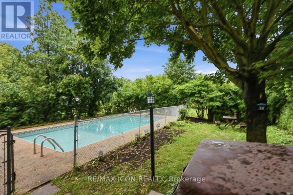 Swimming pool with metal ladder and fence - 25 Upcott Crescent London South