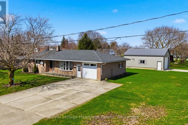 Aerial view of a brick bungalow with a detached garage in South Bruce. - 25 Vincent Street, South Bruce