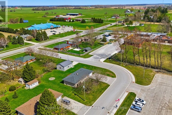 Aerial view of homes, commercial buildings, and fields - 25 Vincent Street South Bruce