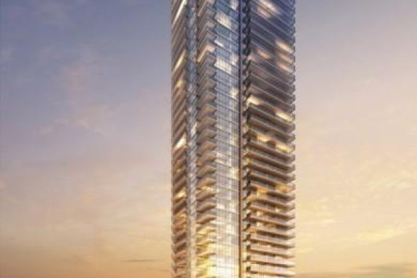 A contemporary glass skyscraper with balconies reaches towards an orange sunset sky. - 2501 - 10 Park Lawn Road, Toronto