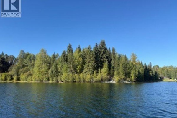 The sky is bright blue with no clouds visible. - 25260 N Ness Lake Road, Prince George