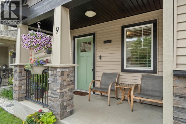 Exterior of the duplex with garage doors and front porch. - 2592 Crestline Street Unit# 9, Kamloops