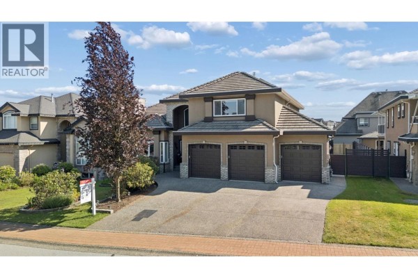 Living room view with staircase, showcasing open layout and bright interior - 2594 Palisade Crescent, Port Coquitlam