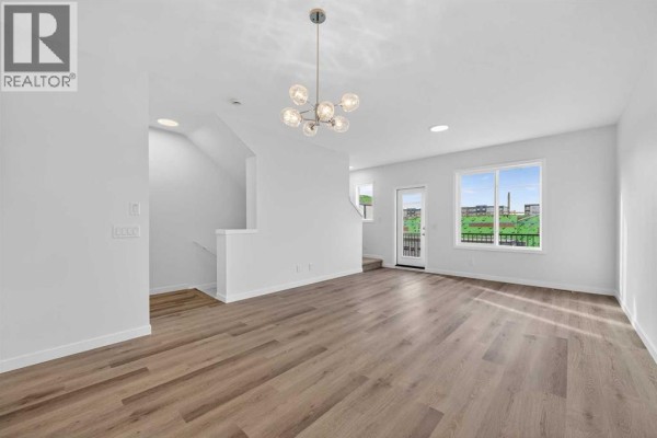 Dining room - 26 Creekside Avenue Sw, Calgary, AB T2X6E2 Photo 4