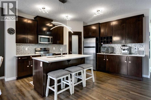Living room - 26 Walden Court Se, Calgary, AB T2X0N8 Photo 5