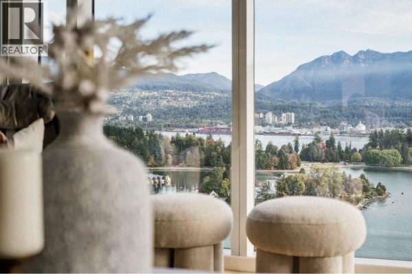 View from the living room showing mountains, water, and forested islands. - 2602 1281 W Cordova Street, Vancouver
