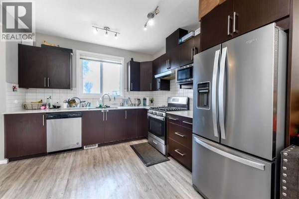 Kitchen - 261 Redstone Street Ne, Calgary, AB T3N1M5 Photo 3