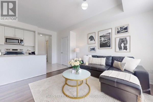 Bedroom with white walls, a large arched window, and a guitar. - 2623 Garrison Crossing, Pickering