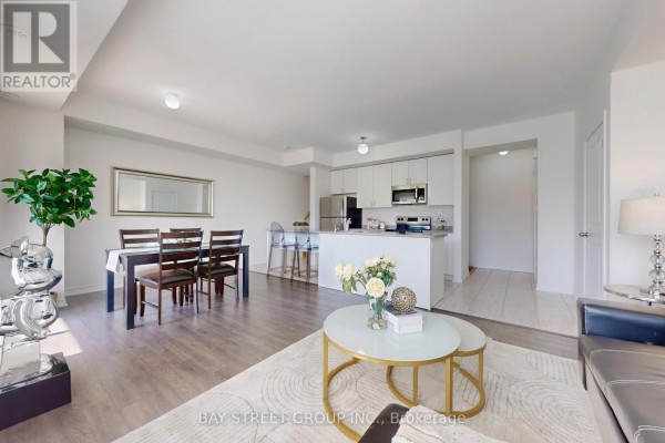 Foyer with two chairs, a cowhide rug, and a desk. - 2623 Garrison Crossing, Pickering