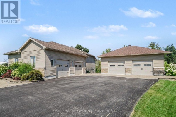 Exterior view of the house with manicured lawn and attached garage - 263 Georgina Street, Drummond/north Elmsley