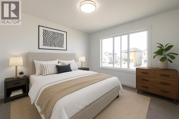 Bedroom with a queen bed, nightstands, and large window for natural light - 264 Clearview Court, Chestermere