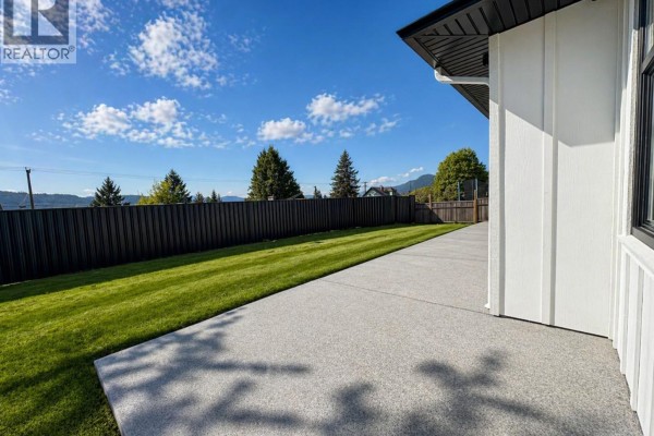 Overhead view of a single-story house on a street with surrounding properties. - 2684 12th Ave, Port Alberni