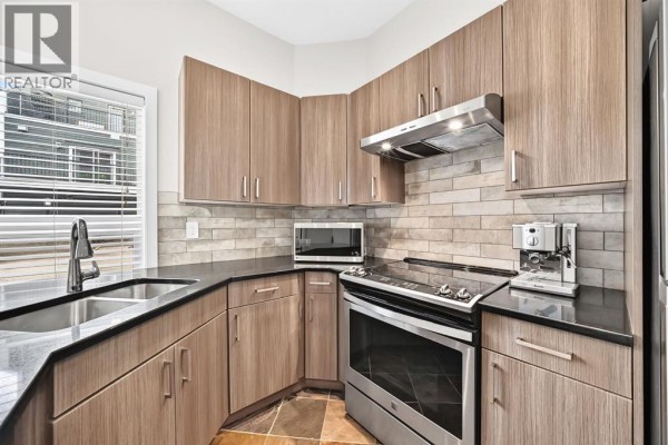 Living room/Dining room - 27, 605 15 Avenue Sw, Calgary, AB T2R0R4 Photo 4
