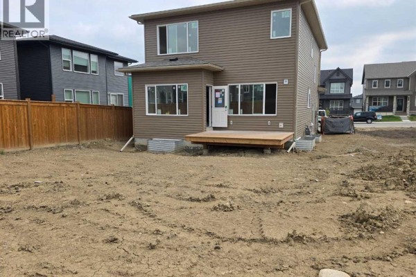 Great room - 27 Creekside Rise Sw, Calgary, AB T2X5V9 Photo 2