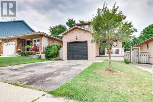 Front exterior view of a two-story house with a driveway and green lawn. - 27 Gerald Crescent, London South