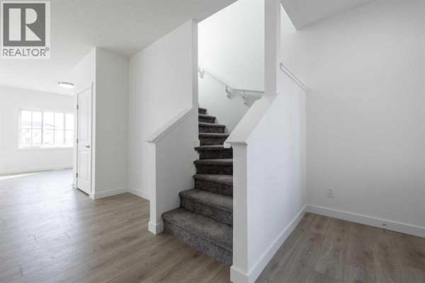 2pc Bathroom - 27 Nova Road, Cochrane, AB T4C3R5 Photo 3