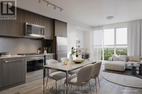 Open concept kitchen and living area with stainless steel appliances, dining table, and sofa. - 2704 - 2545 Simcoe Street N, Oshawa