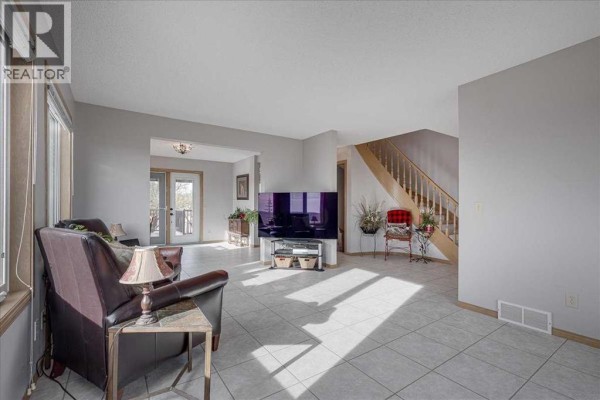 Family room - 273132 Range Road 275, Rural Rocky View County, AB T4B2A4 Photo 4