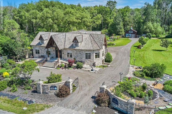 Expansive view of farmland and forested areas surrounding the property. - 2733 Taunton Road, Clarington