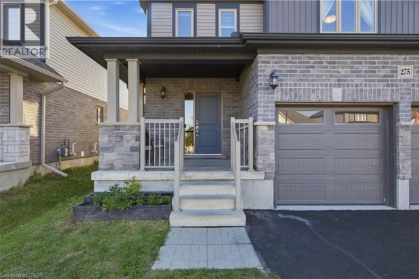 Close-up view of the front entrance porch, showing steps, railings, and the front door of the house. - 275 Bradshaw Drive, Stratford