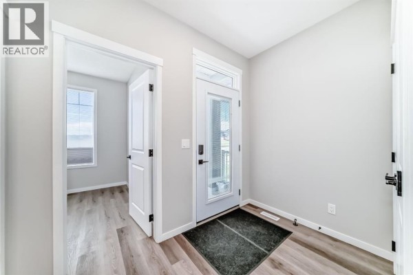 Living room - 276 Belmont Boulevard Sw, Calgary, AB T2X4W6 Photo 3