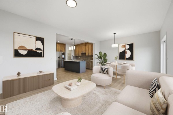 Kitchen area with light wood cabinets, grey tiled backsplash, and a doorway to another room. - 278 Lodge Pole Pl, Leduc