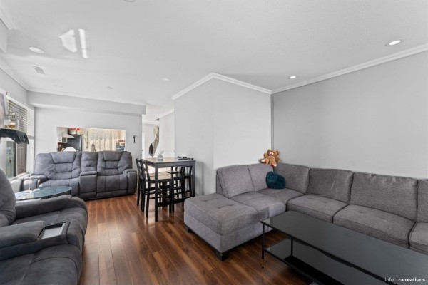 Street view of the townhouse complex with driveways and landscaping - 28 13713 72a Avenue, Surrey