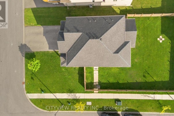 Top-down aerial view of the duplex roof and backyard. - 28 Hartfield Street, Ingersoll