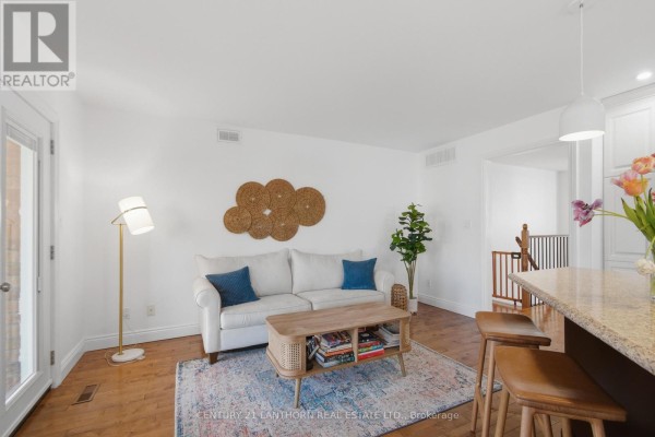 Living room with white sofa and coffee table - 28 Hickory Grove Belleville