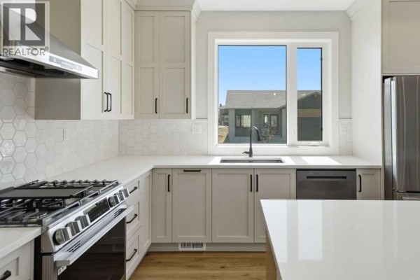 Laundry room - 28 Tipping Avenue, Red Deer, AB T4P0Y9 Photo 4