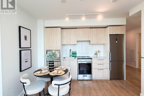 Indoor hot tubs with tiled steps and surrounding seating area in a well-lit common space. - 2805 - 501 Yonge Street, Toronto