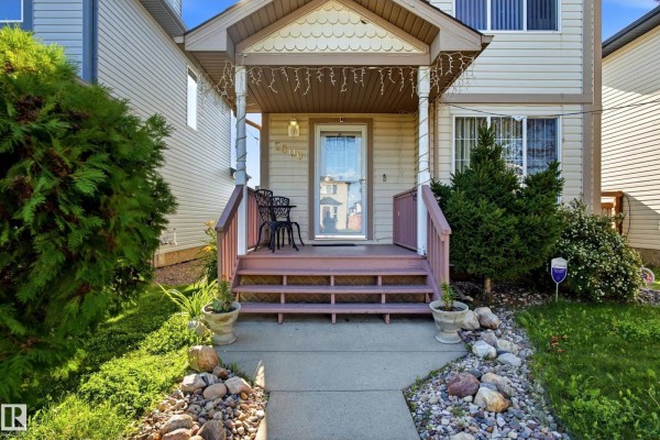 Wooden backyard deck with stairs and a covered gazebo area. - 2806 31 St Nw Nw, Edmonton