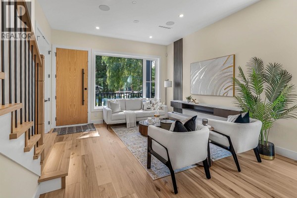 Exterior view of duplex featuring large windows and symmetrical design - 2837 W 31st Avenue, Vancouver