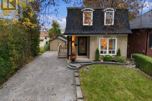 Aerial view of the front exterior of a house with a driveway and shed. - 286 Gliddon Avenue, Oshawa